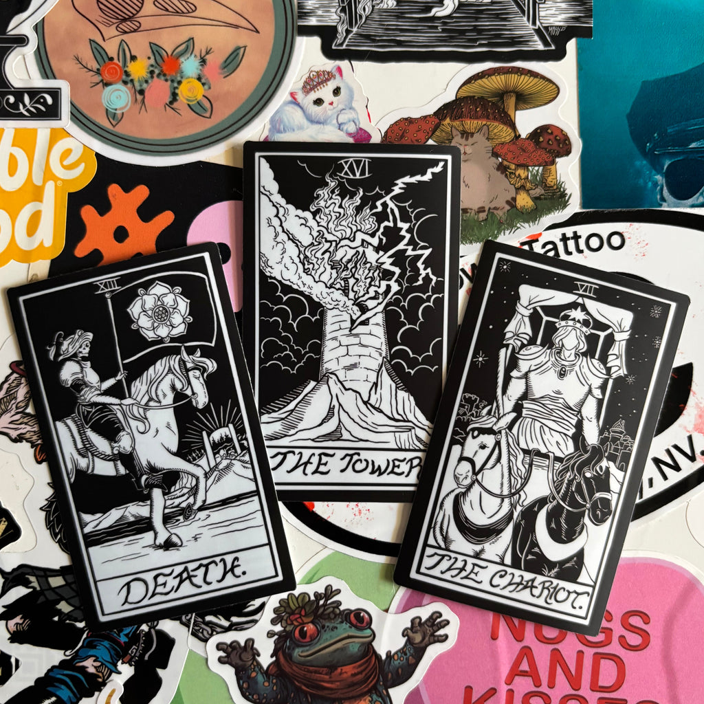 three different tarot inspired stickers for Death, The Tower, and The Chariot