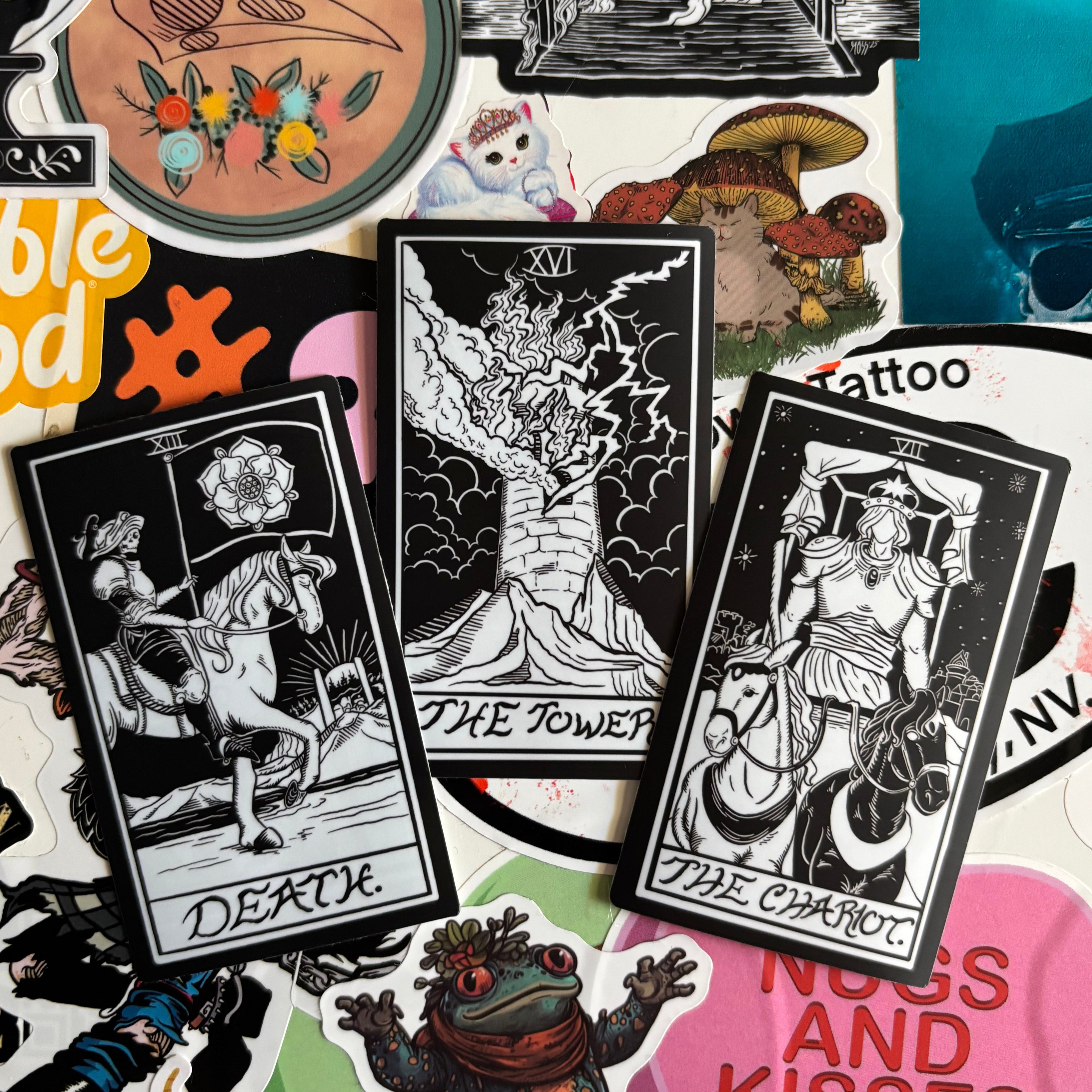 three different tarot inspired stickers for Death, The Tower, and The Chariot