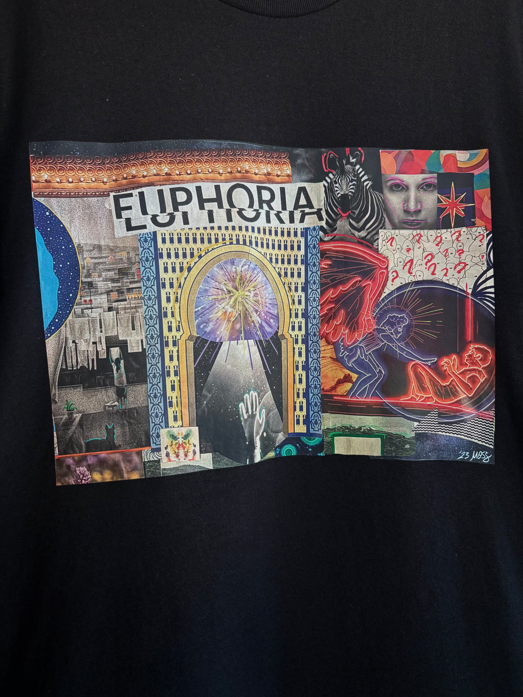 closeup look at  the EUPHORIA collage printed across the front of a black t-shirt