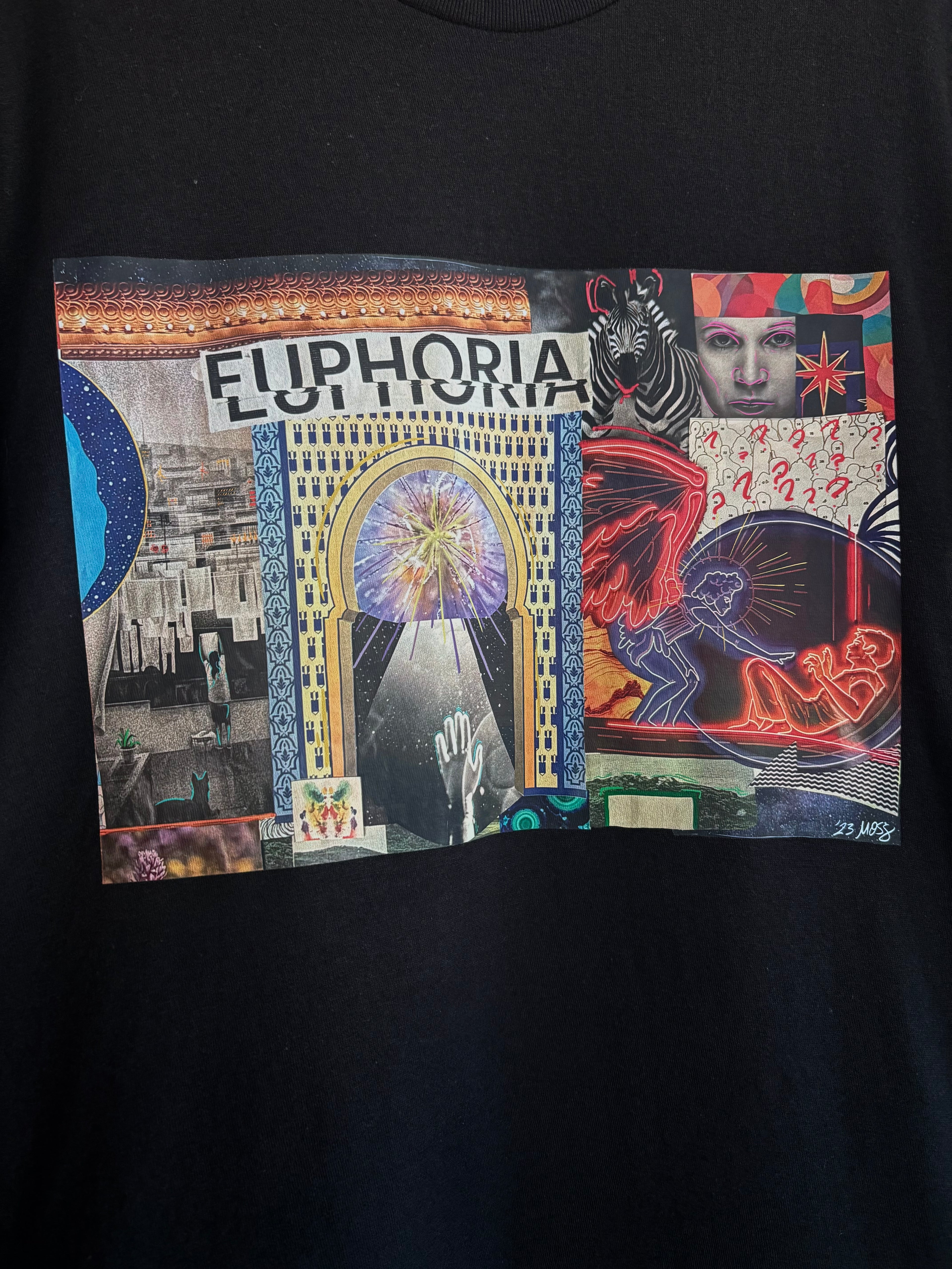 closeup look at  the EUPHORIA collage printed across the front of a black t-shirt