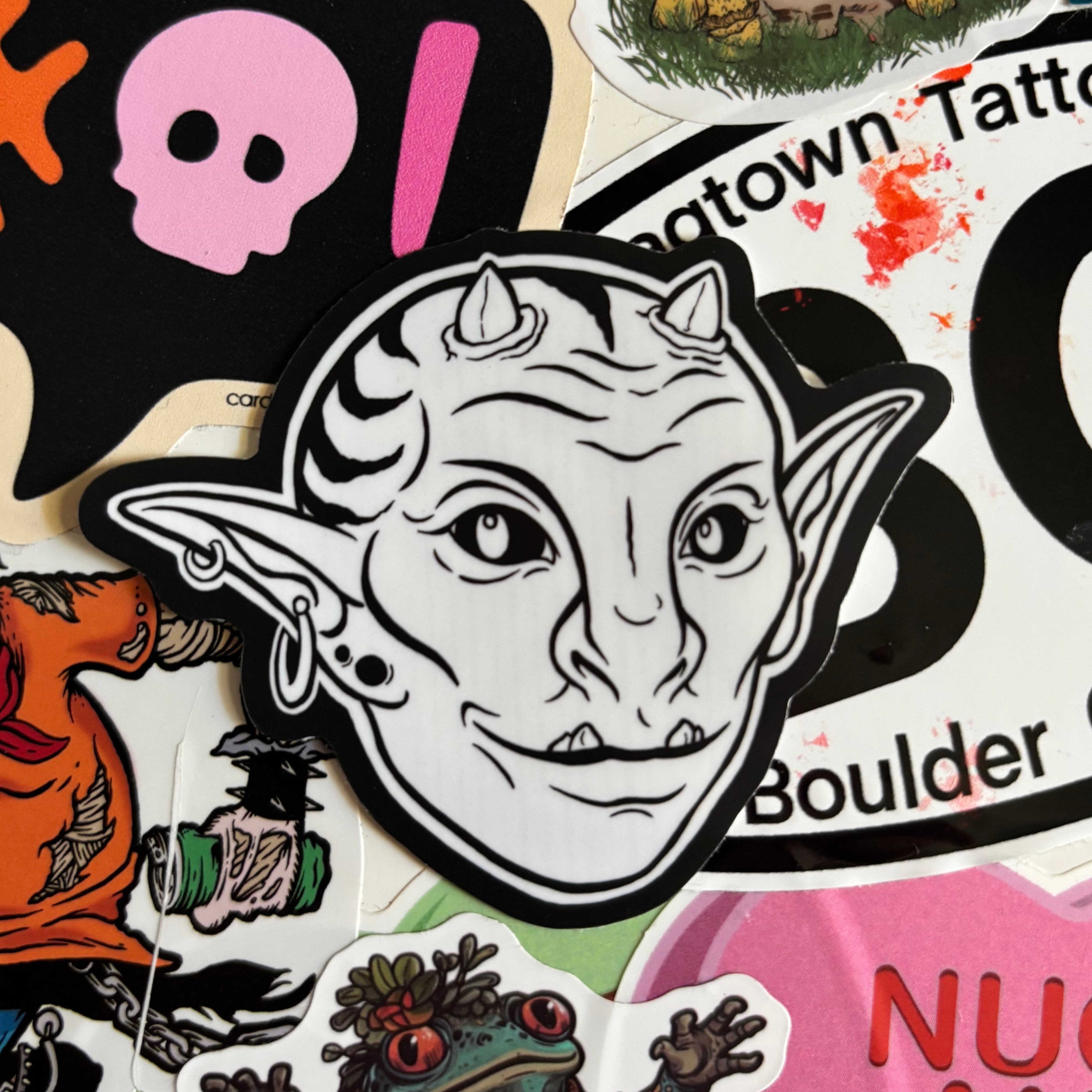 black and white sticker showing the femme goblin "Fern"