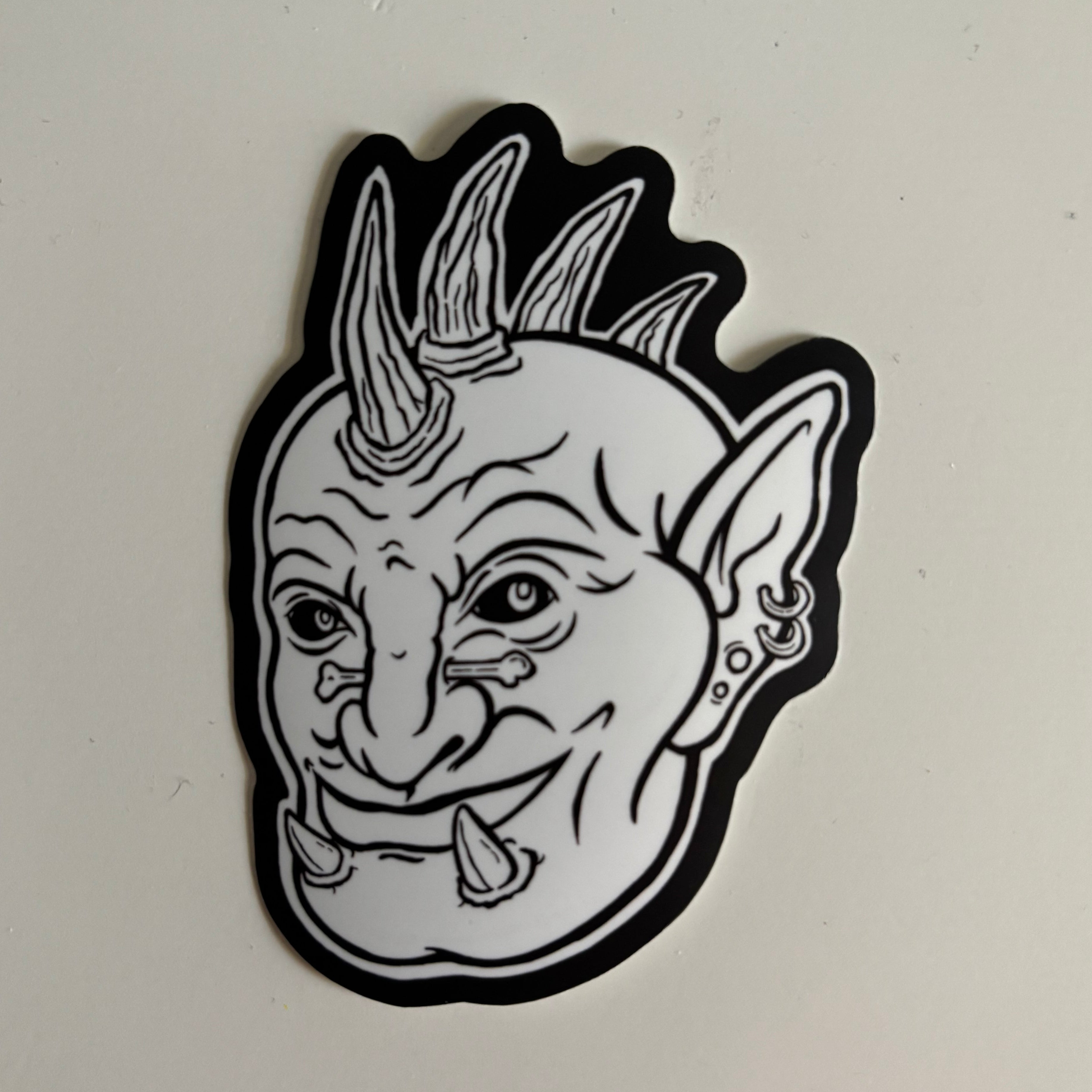 black and white sticker of "Fig" from the Goblin Gang