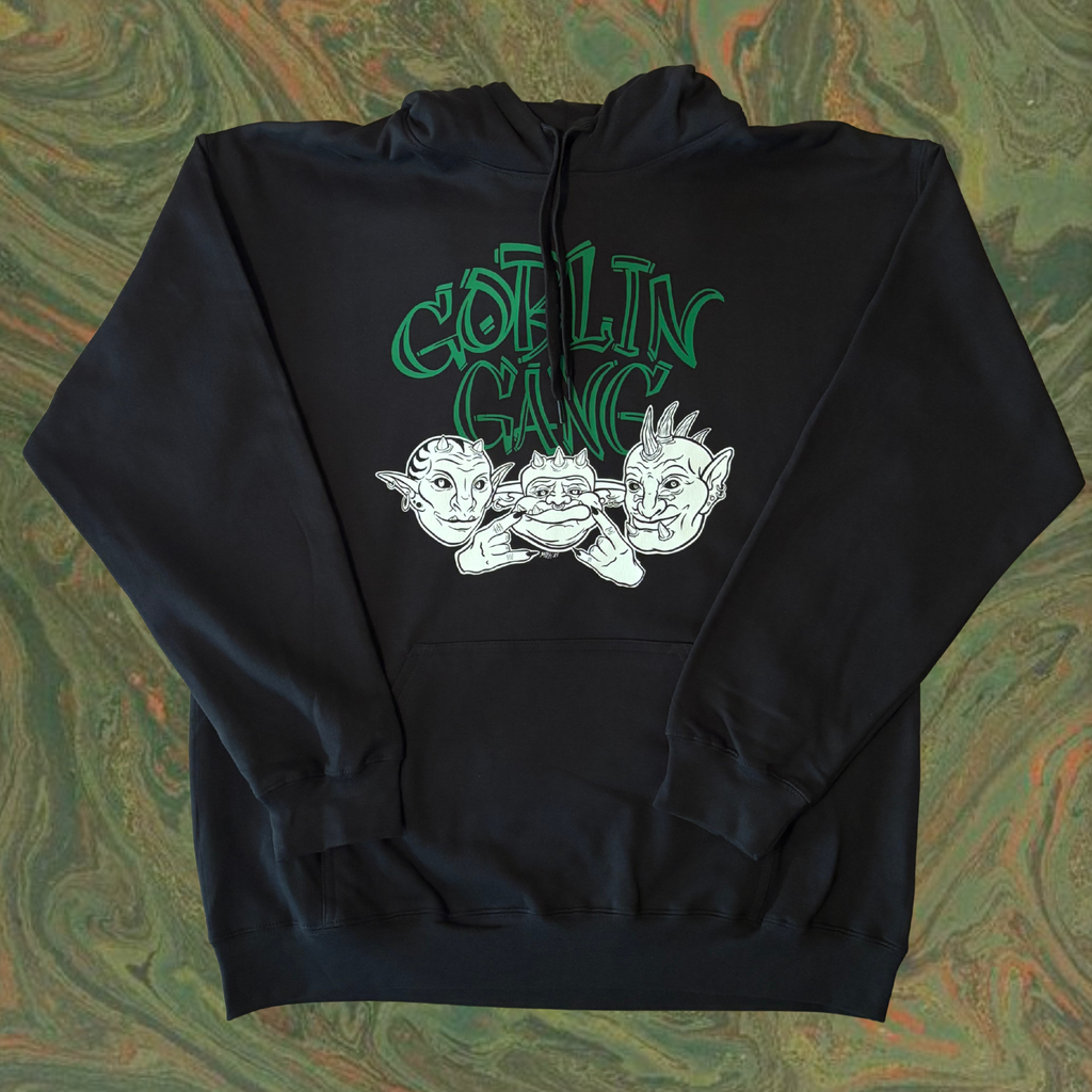 black hoodie with the 'Goblin Gang' design depicting a trio of goblin creatures printed across the chest