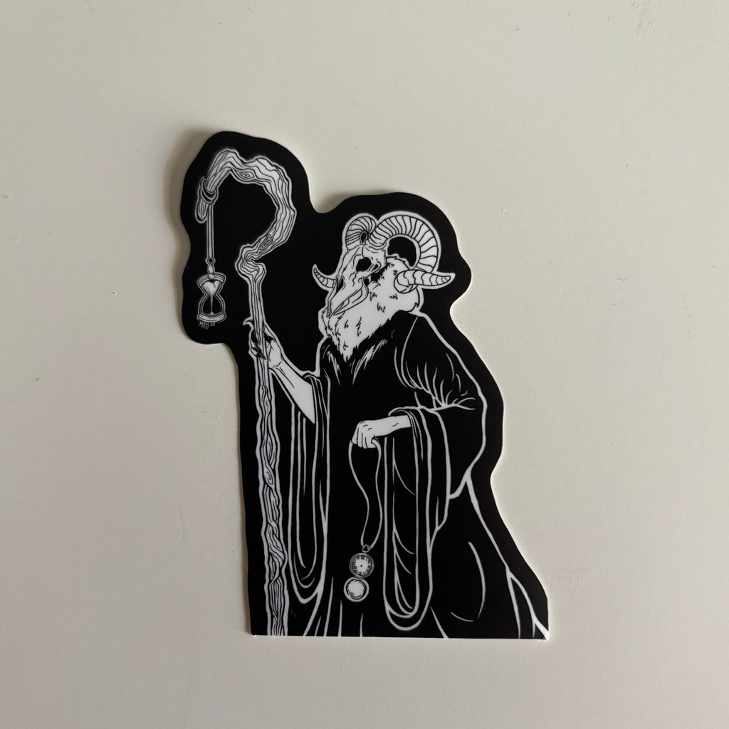 sticker of a scary figure with a ram's head, holding a crooked staff, an hourglass, and a pocket watch