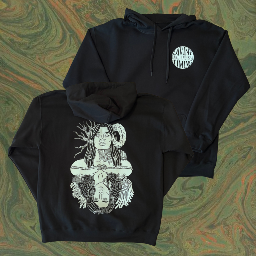 black hoodie with a graphic design of Gaia, a powerful goddess adorned with beaded braids, a ram's horn, trees and mountains, who is connected to Oceanus, a god surrounded by coral and anemones with tentacles in his hair and a starfish and barnacles clinging to his neck