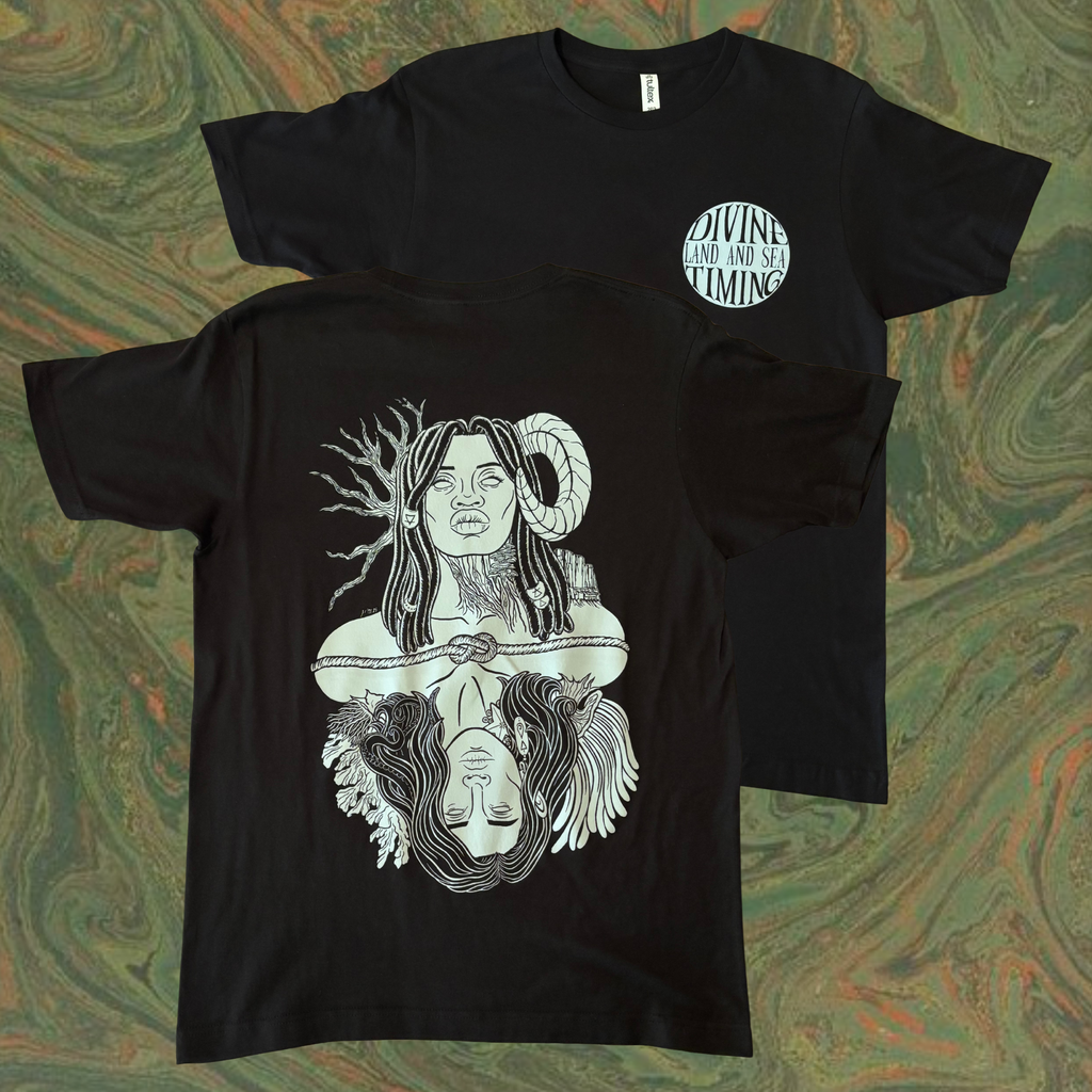 black t-shirt with a graphic design of Gaia, a powerful goddess adorned with beaded braids, a ram's horn, trees and mountains, who is connected to Oceanus, a god surrounded by coral and anemones with tentacles in his hair and a starfish and barnacles clinging to his neck