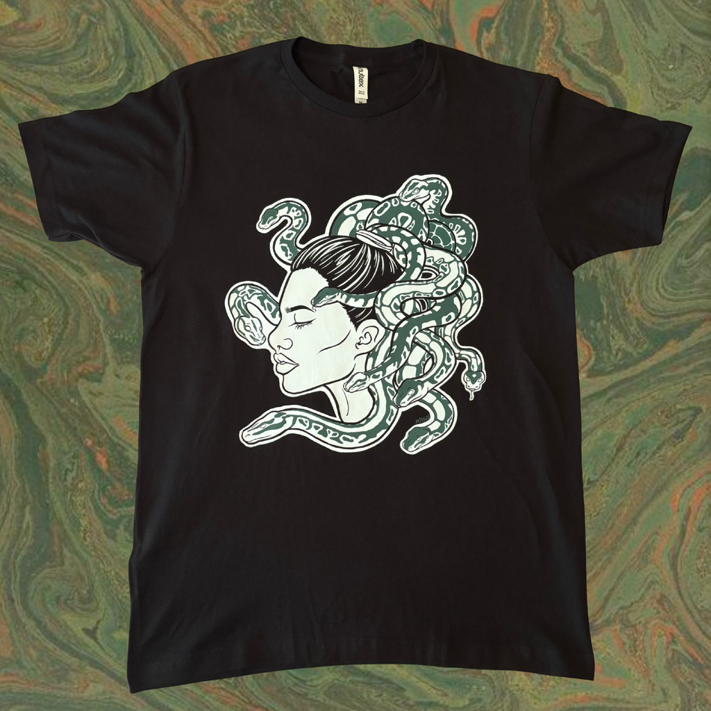 black t-shirt with a Medusa graphic design printed across the chest
