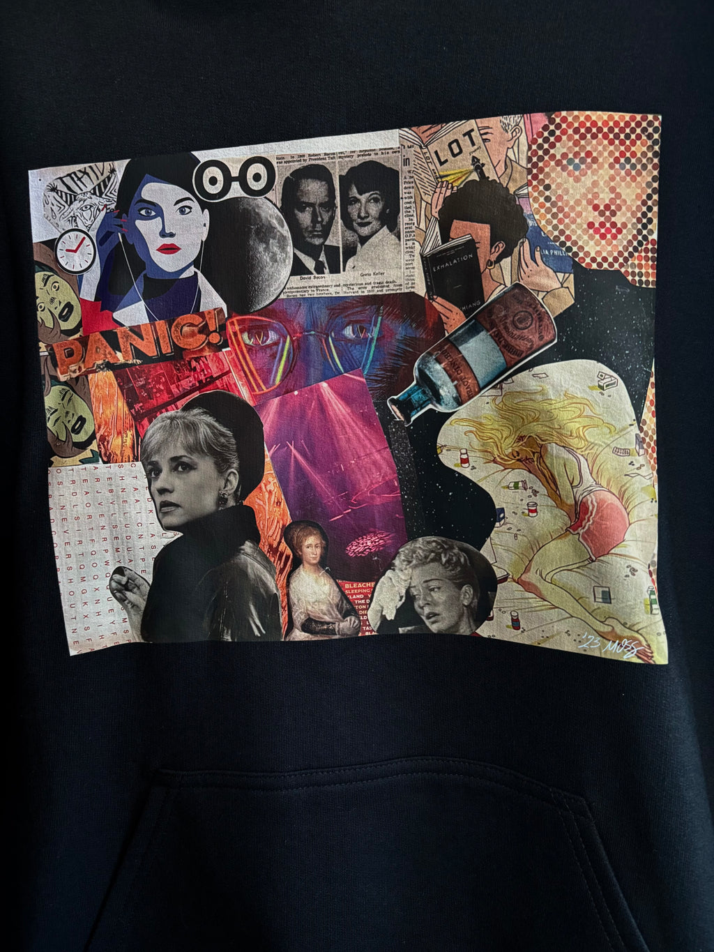 closeup image of the PANIC collage printed on a black hoodie